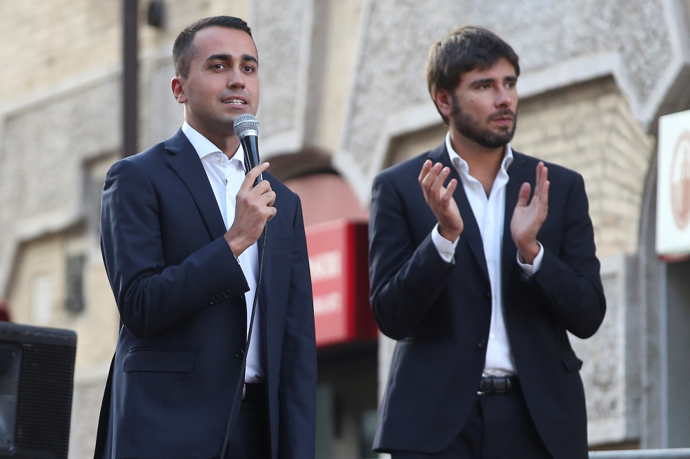 5-Star Movement leader Luigi Di Maio talks during a demonstration against the new electoral law in downtown Rome, Italy, on Wednesday. — Reuters