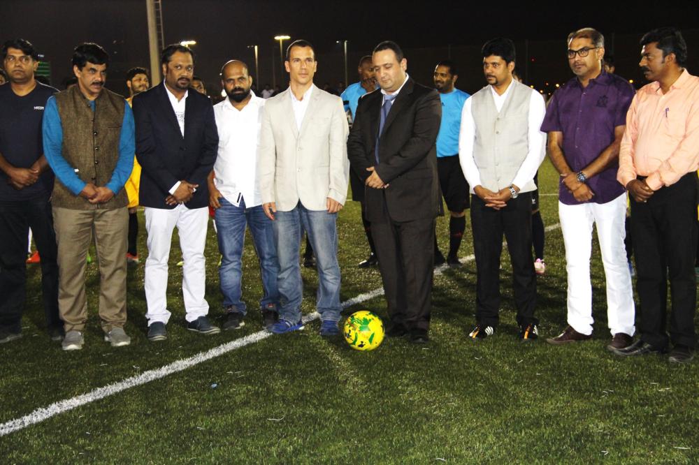 Dr. Ertan Tufekchiyolo is all set to perform the ceremonial kickoff with guests and organizers.