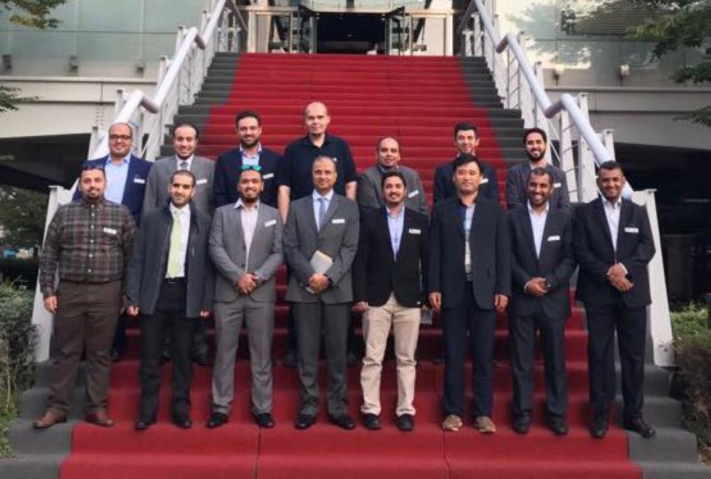 The Saudi young businessmen delegation pose for a group photo during their visit to South Korea