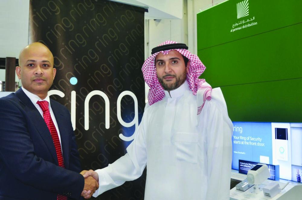 Mohammad Meraj Hoda, MD of Ring, shakes hands with Asim Al Jammaz, CEO, Al Jammaz Distribution after sealing the deal