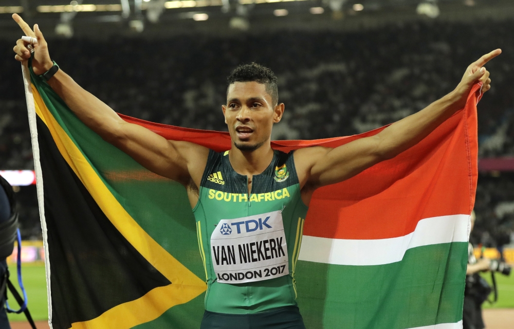 File photo shows South Africa's Wayde van Niekerk celebrating after taking the silver medal in the Men's 200m final during the World Athletics Championships in London. — AP