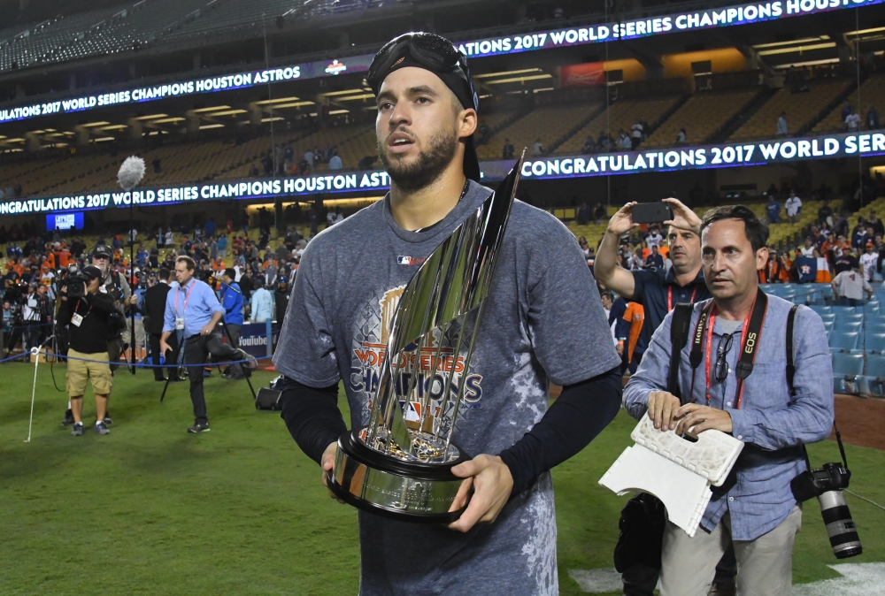 Houston Astros center fielder George Springer with the MVP award after game seven of the 2017 World Series against the Los Angeles Dodgers at Dodger Stadium. — Reuters