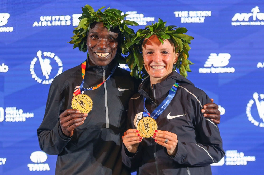 Geoffrey Kamworor of Kenya (left) and Shalane Flanagan of USA (right) pose with their medals after the 2017 TCS New York City Marathon.  — Reuters