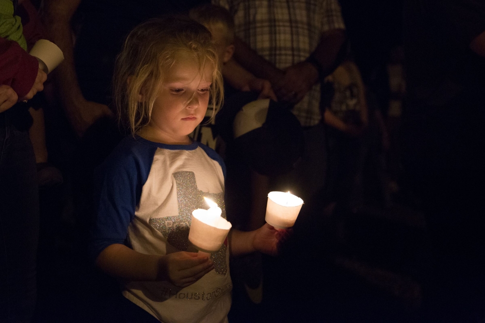 A candlelight vigil is observed on Sunday, following the mass shooting at the First Baptist Church in Sutherland Springs, Texas, that left 26 people dead according to authorities. — AFP