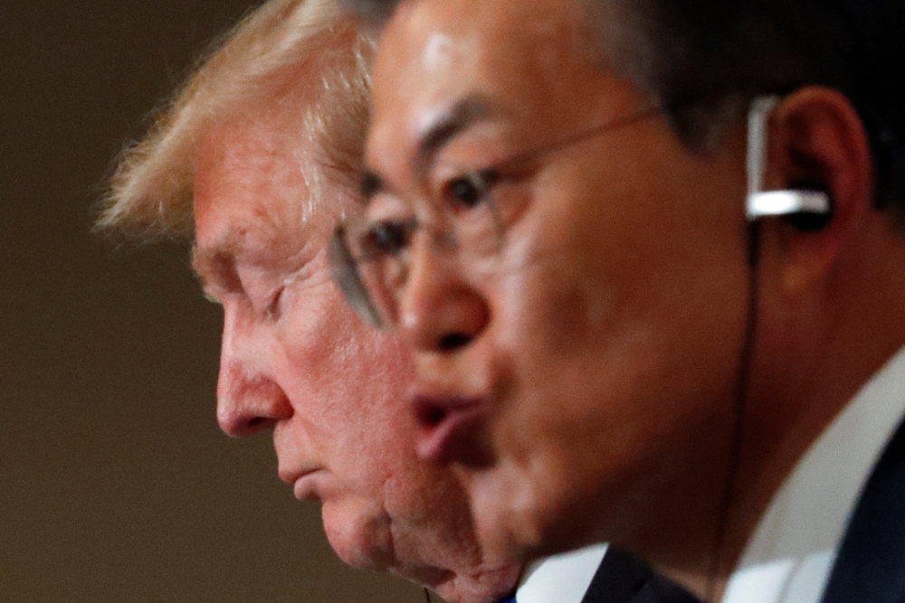 US President Donald Trump and South Korea’s President Moon Jae-in hold a joint news conference at the Blue House in Seoul, South Korea, on Tuesday. — Reuters 