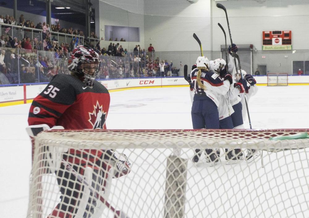 US players celebrates a goal by Megan Bozek (9) on Canada goaltender Ann-Renee Desbiens (35) during the first period of a Four Nations Cup hockey game in Wesley Chapel, Fla., Wednesday. — AP