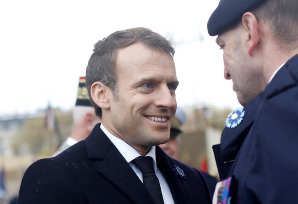 France's President Emmanuel Macron greets a soldier during the Armistice Day ceremonies marking the end of World War I in Paris, France, on Saturday. — Reuters