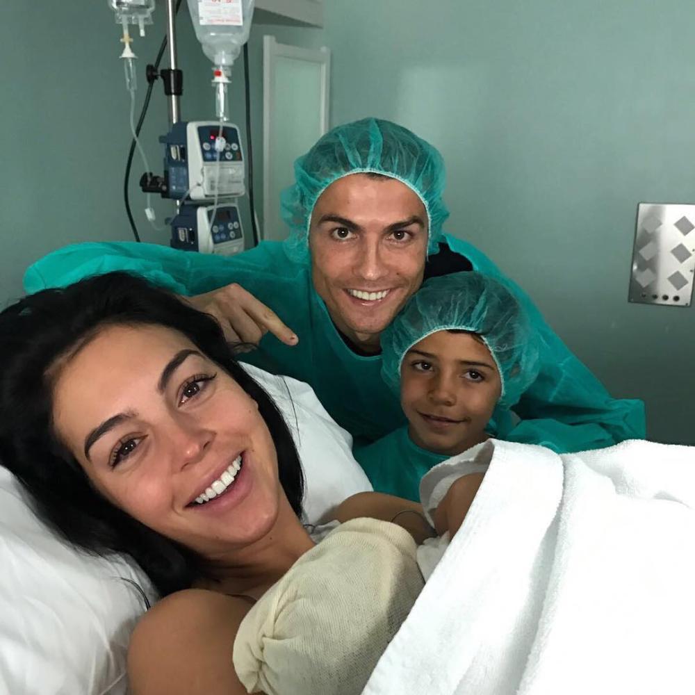 Cristiano Ronaldo is seen in the hospital with girlfriend Georgina Rodriguez and son Cristiano Junior in Madrid on Monday.