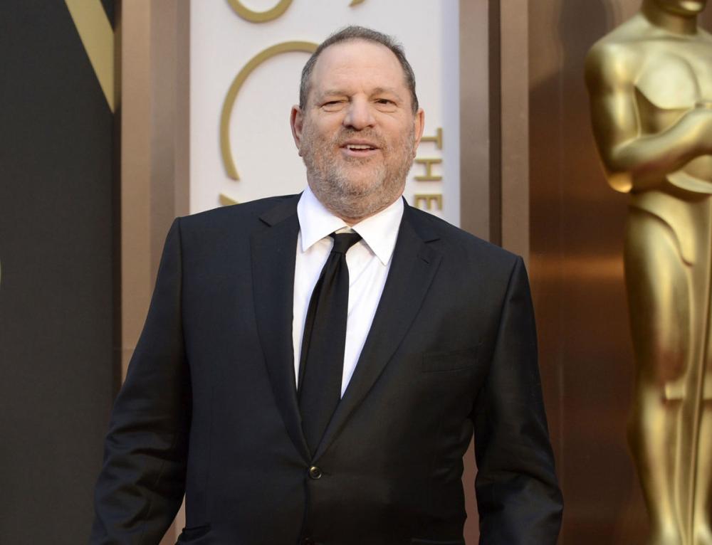 In this March 2, 2014 file photo, Harvey Weinstein arrives at the Oscars in Los Angeles. The sexual harassment and assault allegations against Weinstein that rocked Hollywood and sparked a flurry of allegations in other American industries, as well as the political arena, are reaching far beyond US borders. Emboldened by the women, and men, who have spoken up, the “Weinstein Effect” is rippling across the globe. - AP