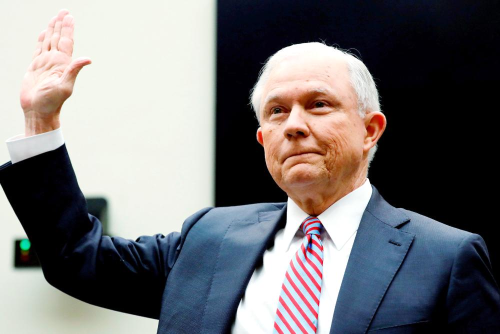 US Attorney General Jeff Sessions is sworn in before testifying  at a House Judiciary Committee hearing on oversight of the Justice Department on Capitol Hill in Washington on Tuesday. — Reuters