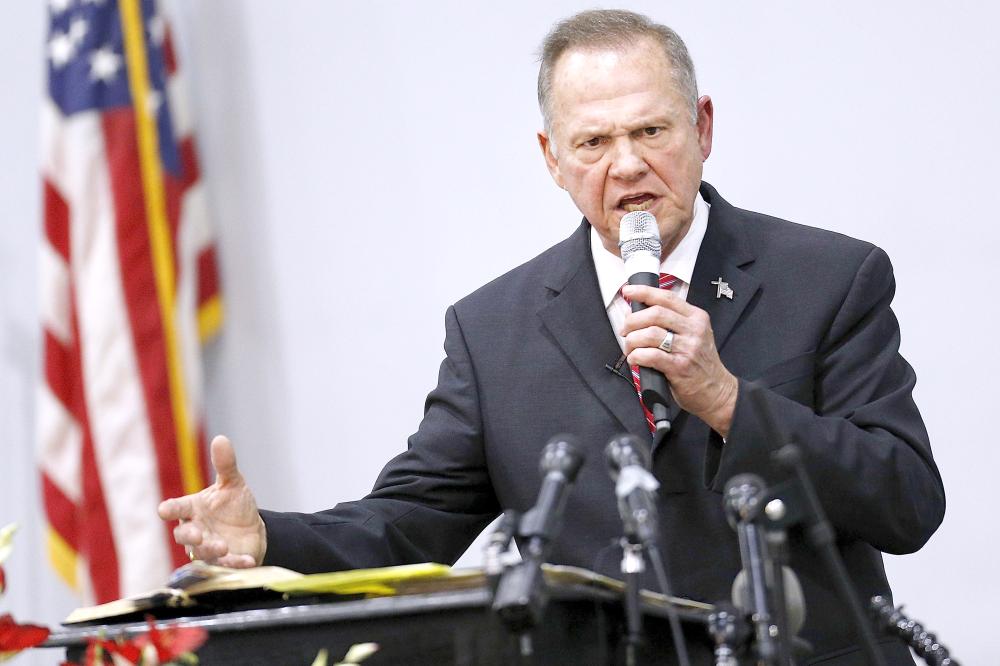 Republican candidate for US Senate Judge Roy Moore speaks during a campaign event at the Walker Springs Road Baptist Church in Jackson, Alabama, on Tuesday. — AFP