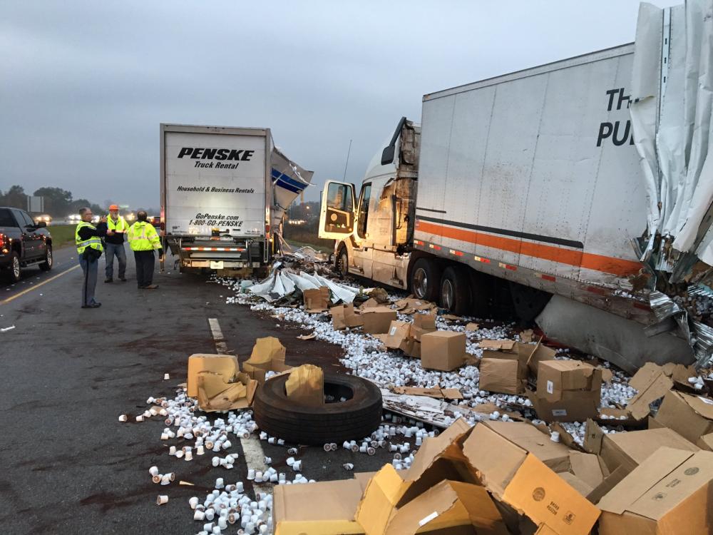 K-Cups are seen littered at the scene of an accident at Indiana Toll Road's Mile Marker 76, near Notre Dame on Wednesday.