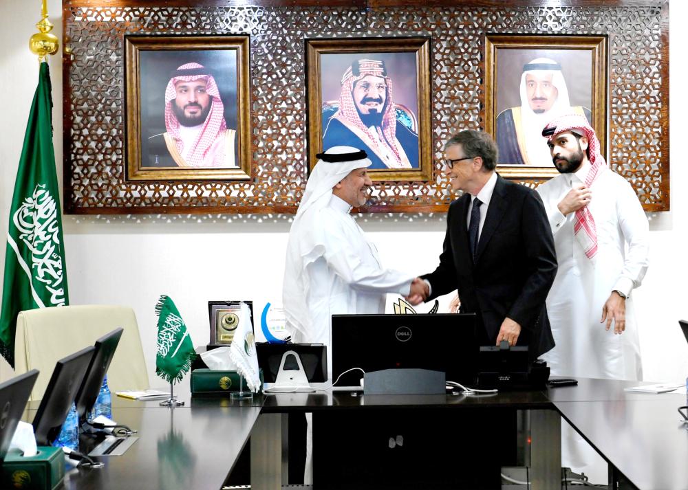 Adviser at the Royal Court and General Supervisor of King Salman Humanitarian Aid and Relief Center (KSRelief) Dr. Abdullah Al-Rabiah receives Bill Gates, Co-chair of Bill and Melinda Gates Foundation, in Riyadh on Wednesday. — SPA