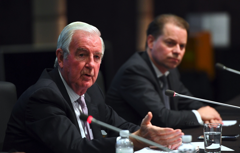 World Anti-Doping Agency (WADA) president Craig Reedie (L) speaks as WADA director general Olivier Niggli (R) looks on, during a press conference after the WADA's foundation board meeting in Seoul on Thursday. The WADA maintained its suspension of Russia, raising the specter of a possible ban from February's Winter Olympics in Pyeongchang. — AFP