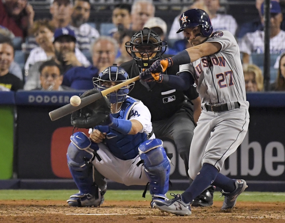In this file photo, Houston Astros' Jose Altuve hits a home run against the Los Angeles Dodgers during the 10th inning of Game 2 of baseball's World Series in Los Angeles. — AP