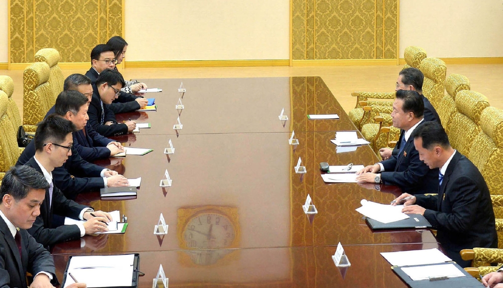 Song Tao, third left, head of the International Liaison Department of the Central Committee of the Communist Party of China, attends a meeting with Choe Ryong Hae, second right, member of the Presidium of the Political Bureau of the Central Committee of the Workers’ Party of Korea, in Pyongyang on Friday.  — AFP