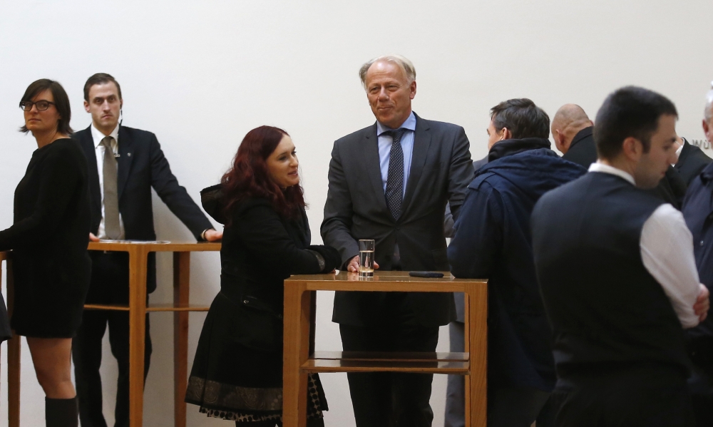 Juergen Trittin of the German Green Party is seen inside the Baden-Wuerttemberg State Representation office during exploratory talks about forming a new coalition government in Berlin, Germany, on Sunday. — Reuters