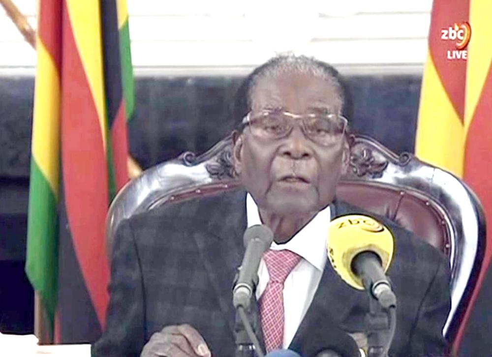 A video grab made on Sunday from footage of the broadcast of Zimbabwe Broadcasting corporation (ZBC) shows Zimbabwe’s President Robert Mugabe delivering a speech in Harare, following a meeting with army chiefs who have seized power in Zimbabwe. — AFP