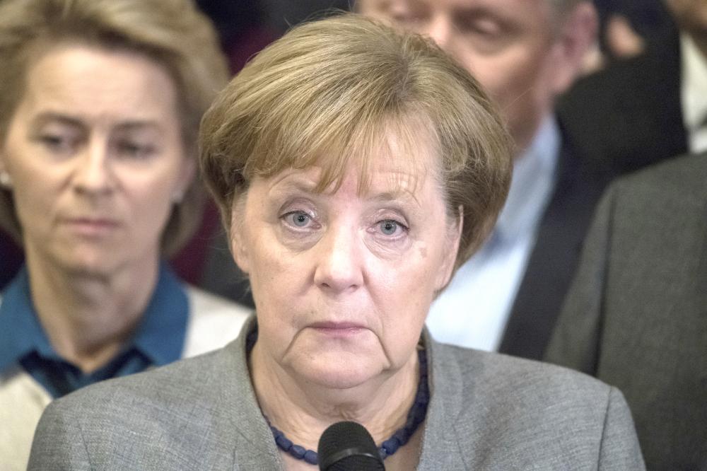 German Chancellor Angela Merkel gives a statement after exploratory talks on forming a new government broke down on in Berlin on Sunday. — AP