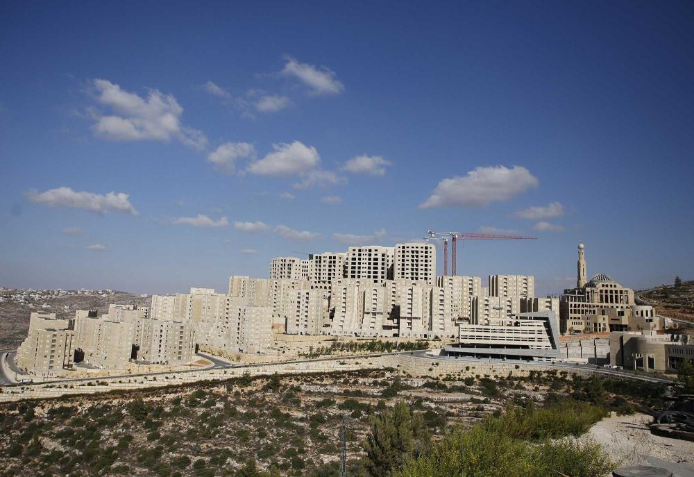 So far only some 3,000 people live in the pristine rows of beige tower blocks that have gone up since work began from scratch in the barren hills just north of Ramallah almost a decade ago on the first ever planned city to be built by Palestinians in the territory.