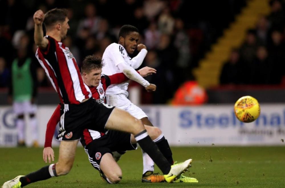 Fulham's Ryan Sessegnon scores their fifth goal to complete his hat-trick against Sheffield United in the English Championship match at Bramall Lane, Sheffield,on Tuesday. — Reuters