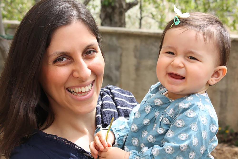 An undated handout image released by the Free Nazanin campaign in London shows Nazanin Zaghari-Ratcliffe (left) posing for a photograph with her daughter Gabriella. — AFP