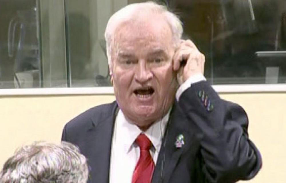 

Bosnian Serb military chief Ratko Mladic during an angry outburst in the Yugoslav War Crimes Tribunal in The Hague, Netherlands, Wednesday. — AP