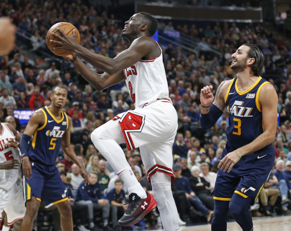 Chicago Bulls guard Jerian Grant (2) goes to the basket as Utah Jazz guard Ricky Rubio (3) watches during the first half of an NBA basketball game Wednesday in Salt Lake City. — AP