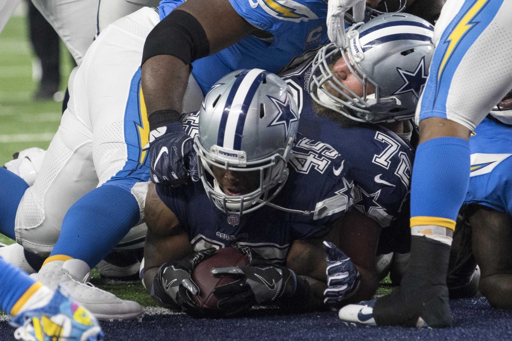 Dallas Cowboys fullback Rod Smith (45) scores a touchdown against the Los Angeles Chargers during the second half at AT&T Stadium. The Los Angeles Chargers defeated the Dallas Cowboys 28-6. — Reuters