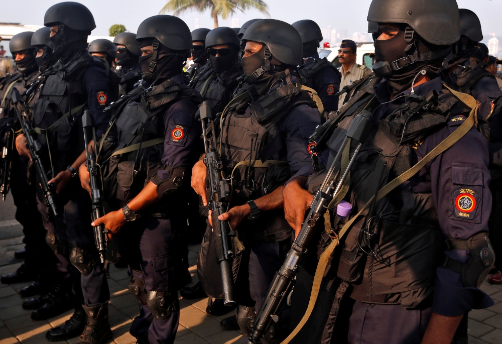 Police commandos wait to pay tribute at a police memorial marking the ninth anniversary of the Mumbai 2008 attacks, which killed 166 people, in Mumbai, India, on Sunday. — Reuters