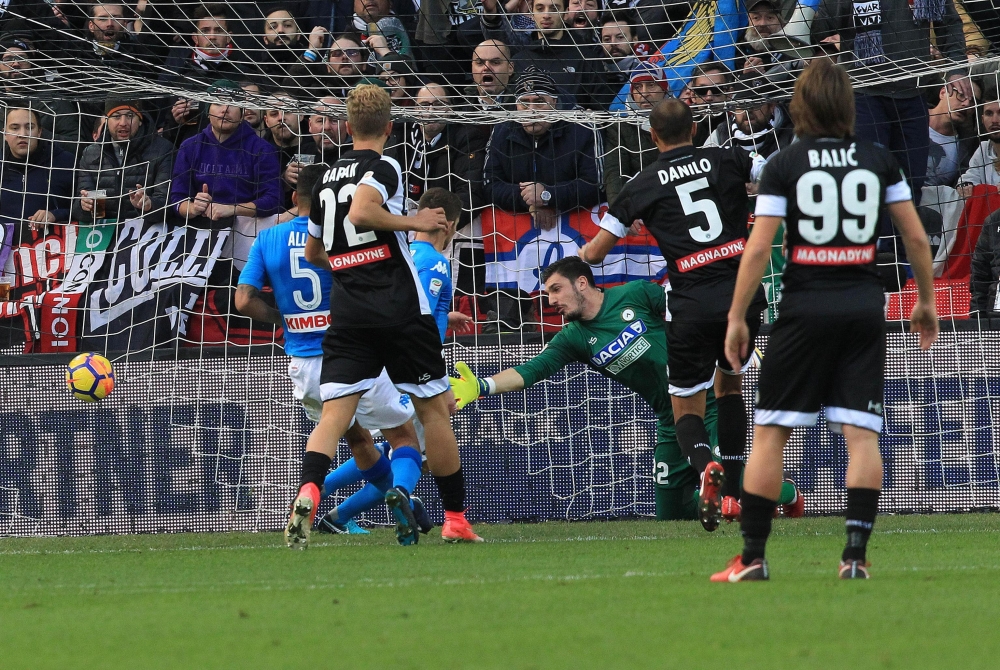 Napoli's Jorginho, 3rd from left, scores during a Serie A soccer match between Napoli and Udinese at the Friuli stadium in Udine, Italy, Sunday. – AP