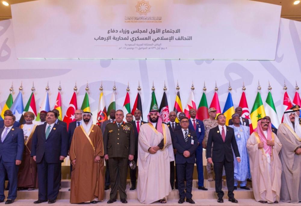 Ministers of defense and representatives of 41 member states of the Islamic Military Counter Terrorism Coalition (IMCTC) stand for a group photo before their inaugural meeting in Riyadh on Sunday. — SPA