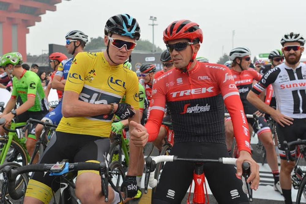 Chris Froome, left, and Alberto Contador, right, seen in this file photo at the start of the TDF Shanghai Criterium.