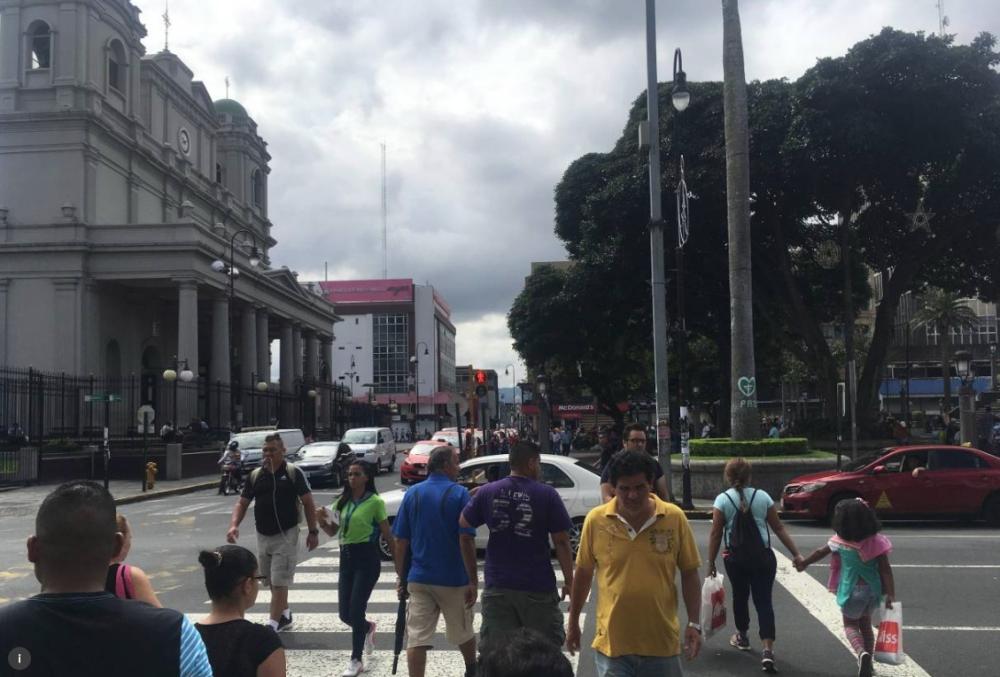 Pedestrian cross a street in San Jose, Costa Rica, in this file photo. — Reuters