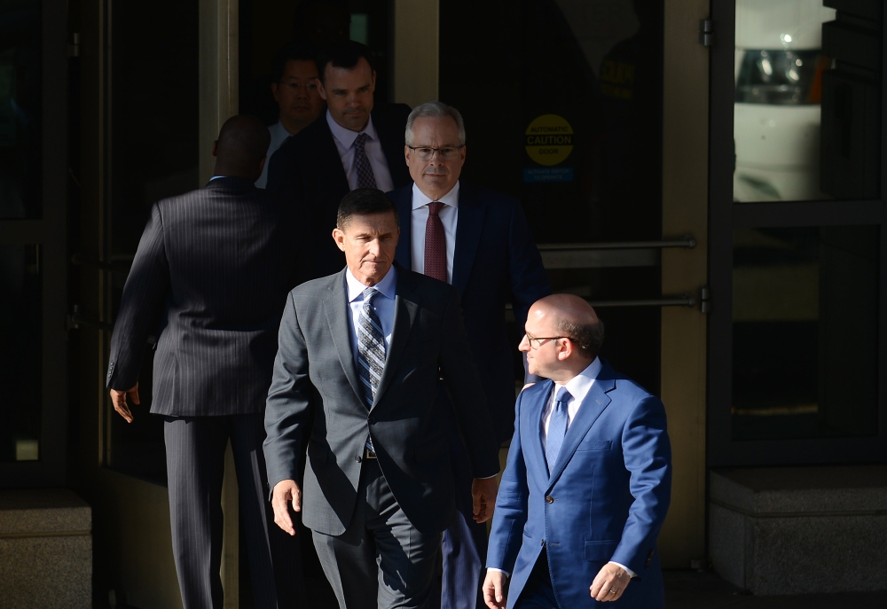 Michael Flynn, former national security adviser to President Donald Trump, leaves following his plea hearing at the Prettyman Federal Courthouse in Washington on Friday. — AFP