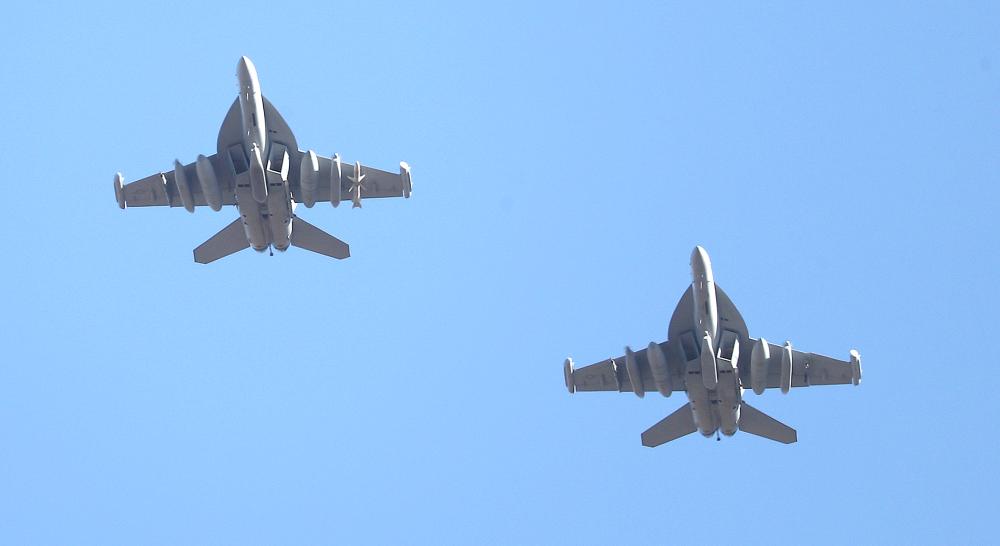 US Air Force EA-18G Growler fighter jets fly over the Osan Air Base in Pyeongtaek, South Korea, on Monday. — Reuters
