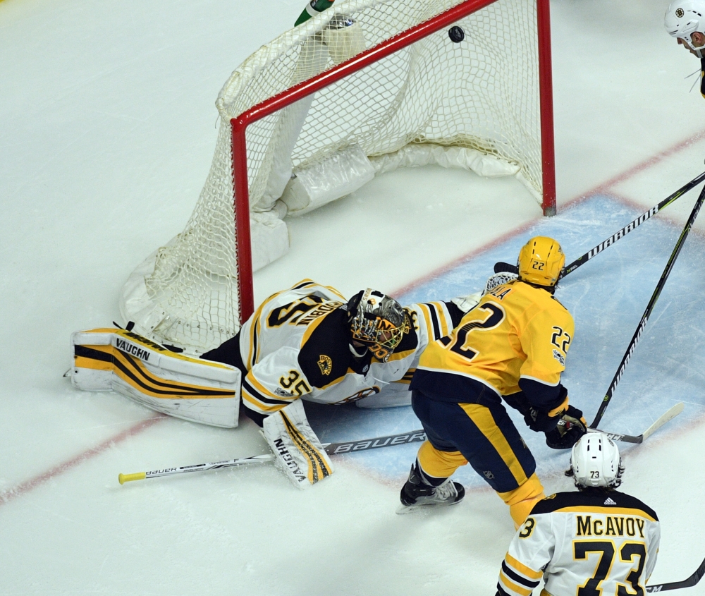 Nashville Predators left wing Kevin Fiala (22) scores past Boston Bruins goalie Anton Khudobin (35) during the second period at Bridgestone Arena. — Reuters