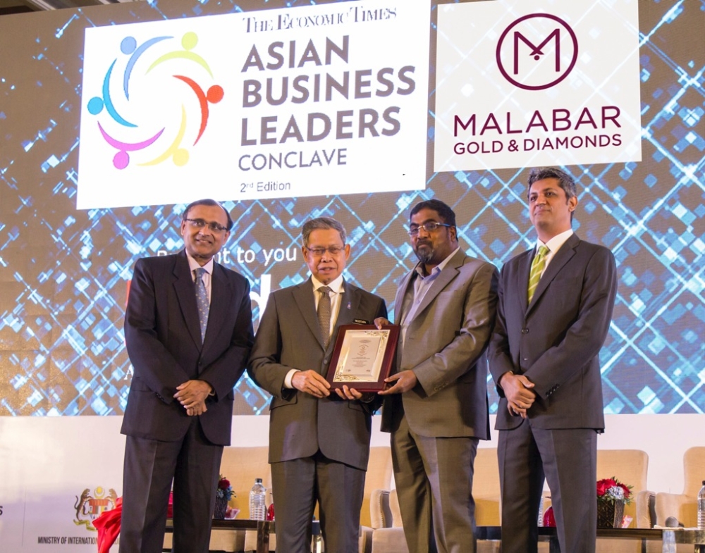 MP Ahammed, Chairman, Malabar Group, receives the Business Excellence Award from Dato Sri Mustapa Bin Mohammed, Minister of Industrial & International Trade, Malaysia, in the presence of T.S Tirumurti, Indian High Commissioner for Malaysia and Deepak Lamba, President – TSSL and CEO of Worldwide Media at the Economic Times Asian Business Leaders Conclave 2017 held at Kuala Lumpur, Malaysia
 
