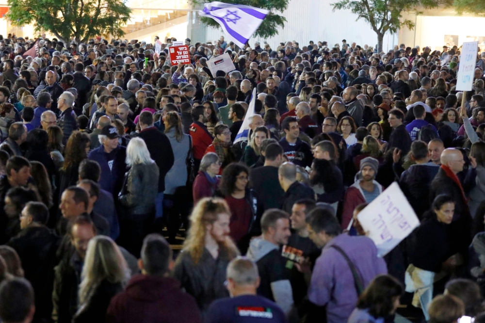 Israelis take part in a demonstration under the name 