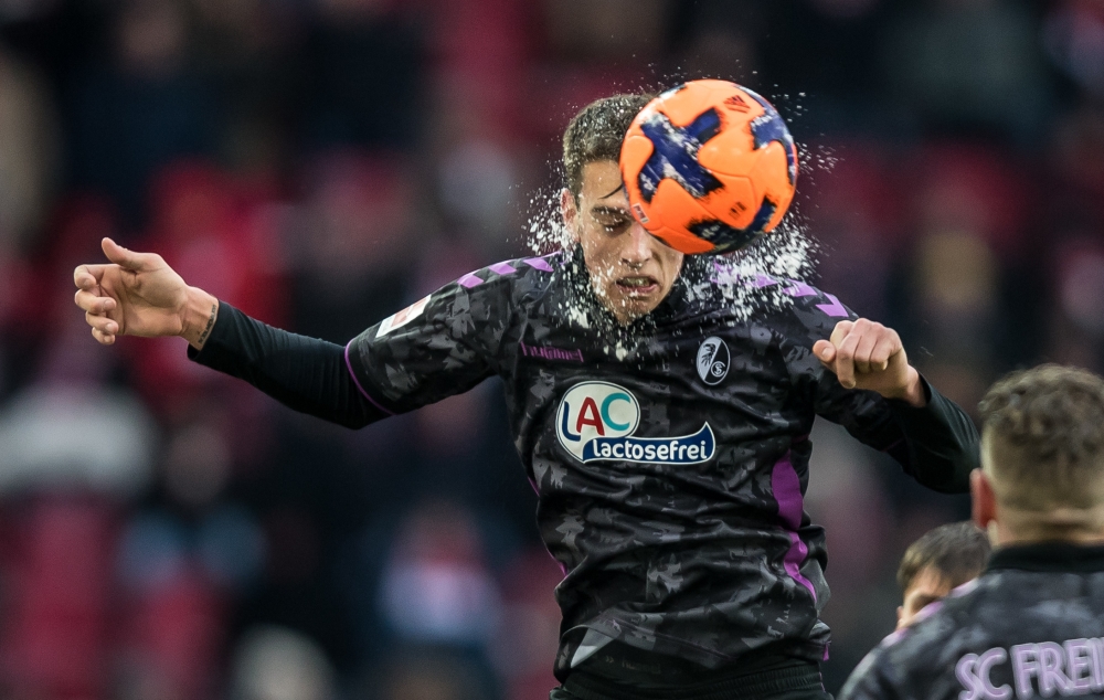 Freiburg's German forward Janik Haberer heads the ball during the Bundesliga football match against FC Cologne on Sunday in Cologne, western Germany. — AFP