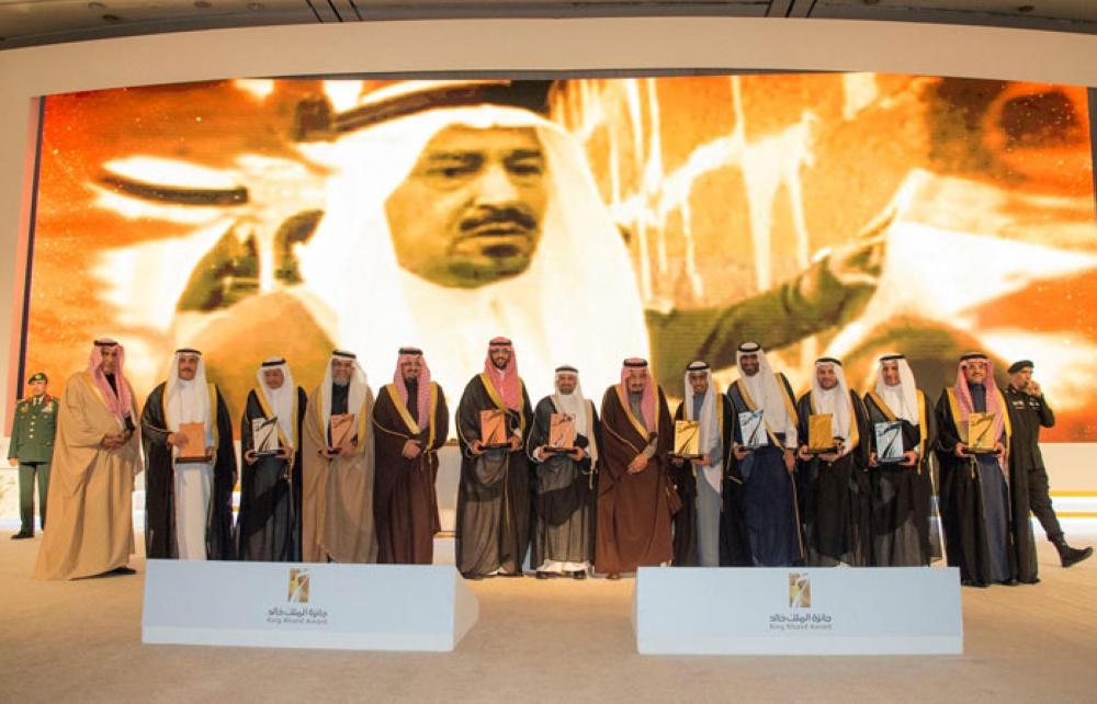 Custodian of the Two Holy Mosques King Salman poses for a group photo with winners of King Khalid Award in Riyadh on Monday evening. — SPA