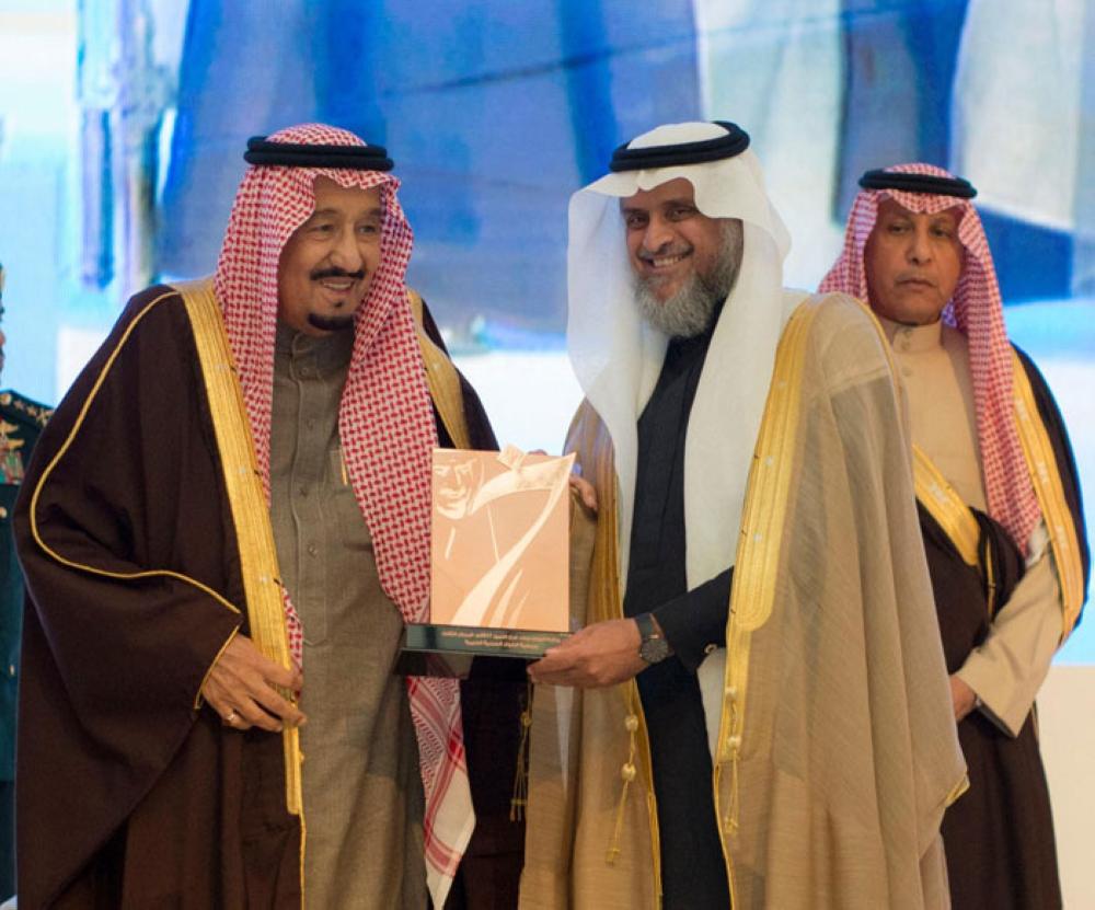 Custodian of the Two Holy Mosques King Salman poses for a group photo with winners of King Khalid Award in Riyadh on Monday evening. — SPA