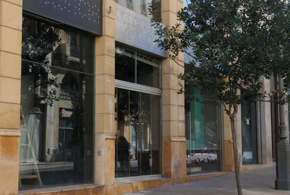 A closed Starbucks coffee shop is seen in downtown Beirut. — Reuters