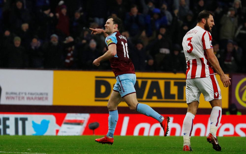 
Burnley’s Ashley Barnes celebrates after scoring against Stoke City during their Premier League game at Turf Moor, Burnley, Tuesday. — Reuters