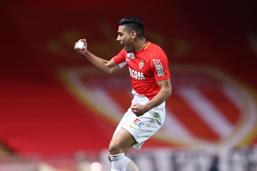 Monaco’s Colombian forward Radamel Falcao celebrates after scoring a goal during the French League Cup round of 16 football match against Caen at the Louis II Stadium in Monaco Tuesday. — AFP