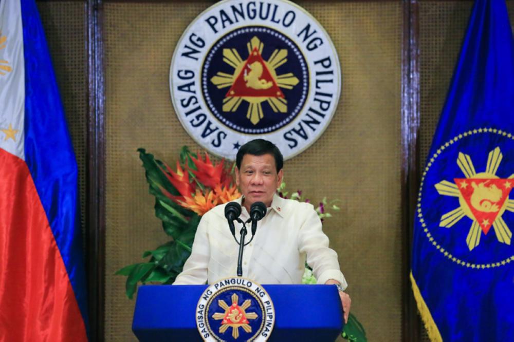 Philippines President Rodrigo Duterte, seen at the Malacañan Palace in this file photo, is set to sign a tax reform bill which is on the heart of his economic agenda. The bill was passed Thursday. 
