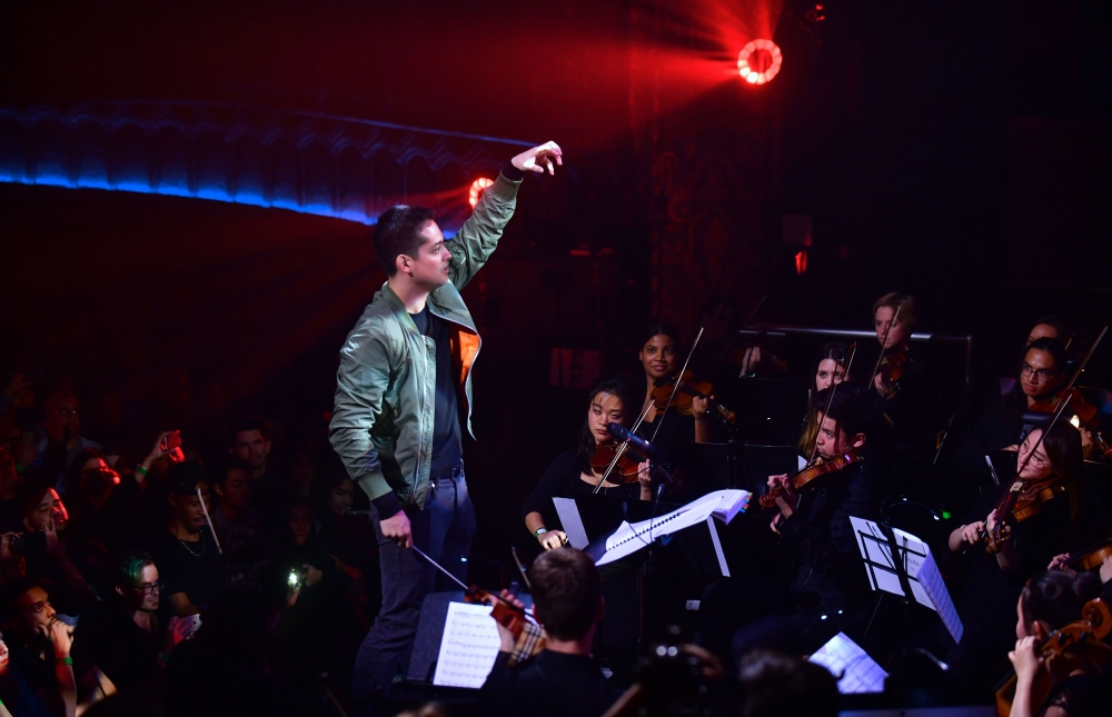 Yuga Cohler, Music Director of the Young Musicians Foundation (YMF) Debut Chamber Orchestra leads the orchestra during a performance of Yeethoven II in Los Angeles, California. - AFP