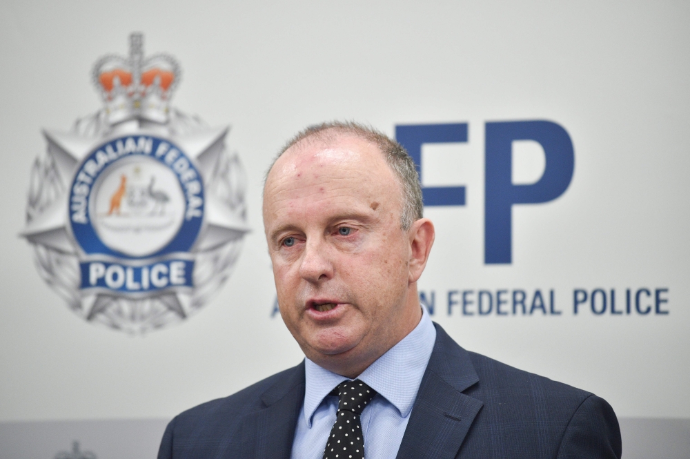 Australian Federal Police Assistant Commissioner Neil Gaughan speaks to the media about a North Korean agent in Sydney on Sunday. — AFP