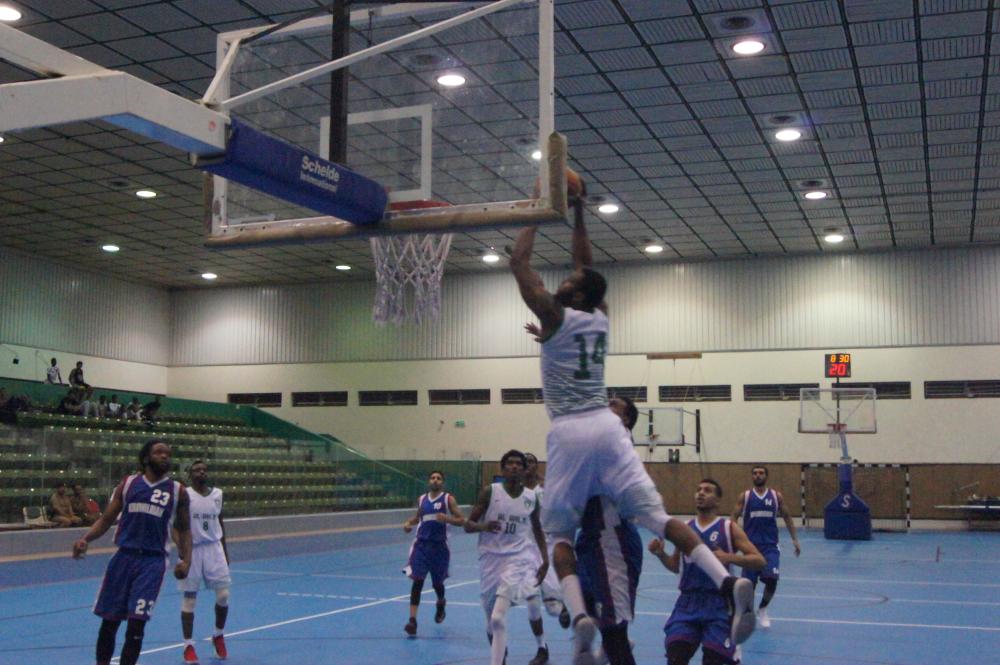 Ahli’s Emanual Jones flying high for a dunk.
