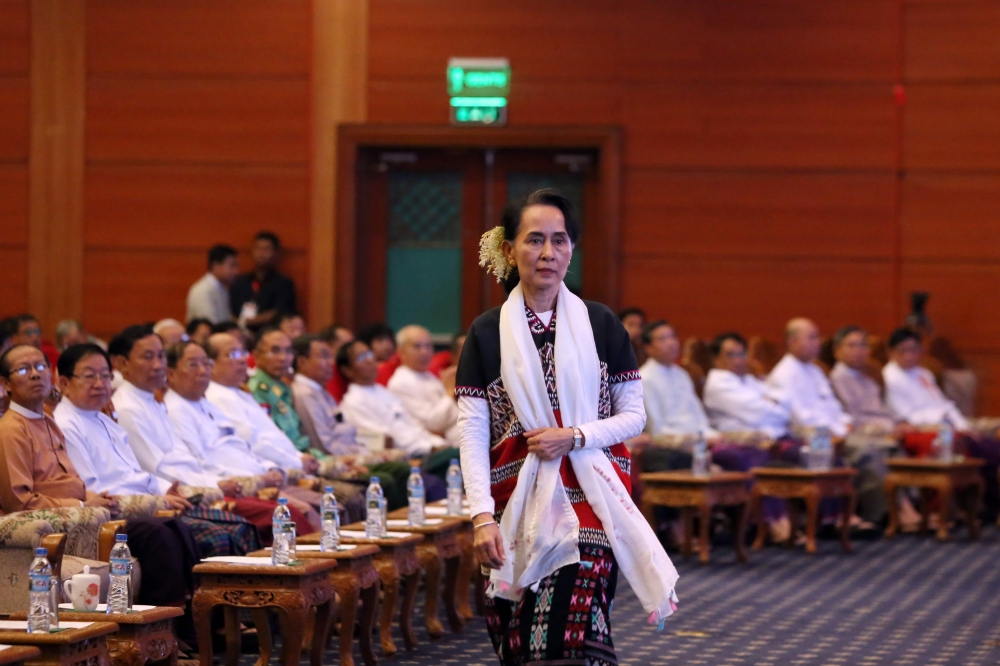 Myanmar’s State Counselor Aung San Suu Kyi attends a Karen New Year ceremony in Naypyidaw on Monday. — AFP